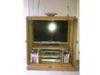 Pine Enclosed Television Cabinet. I am selling this unit....